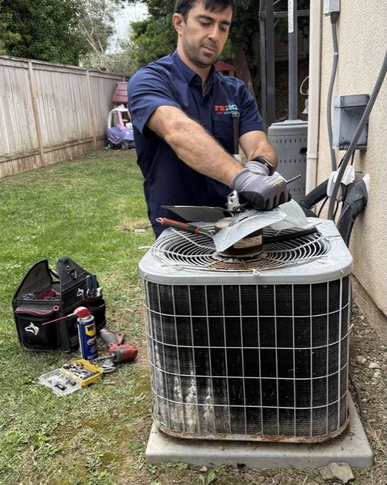 Prime Air Solutions technician performing seasonal HVAC maintenance