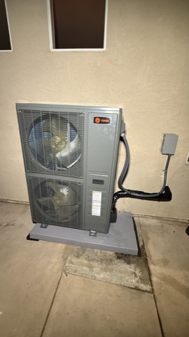 Trane heat pump condenser with disconnect