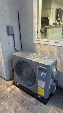 AC Pro condenser beside kitchen window